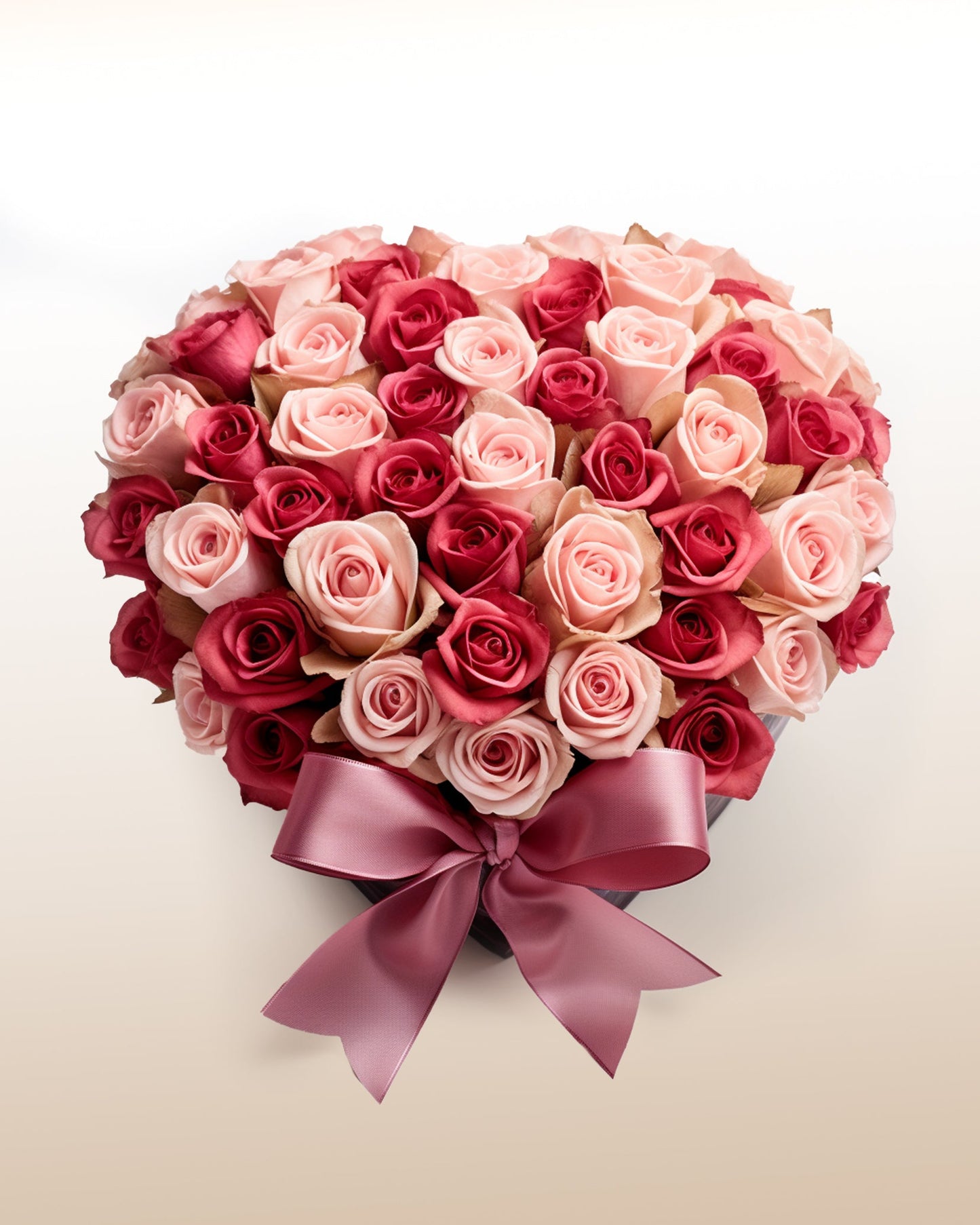 A refined arrangement of premium roses in radiant pink and red tones. Elegant, expressive, and delivered worldwide with care.