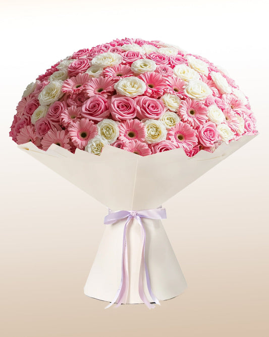 A grand luxury arrangement featuring roses and gerberas. Refined, expressive, and handcrafted.