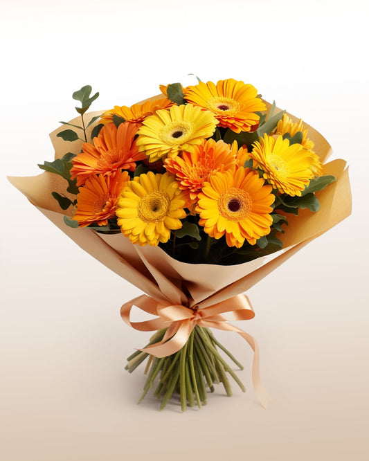 A joyful bouquet of yellow gerberas and seasonal blooms. Bright, uplifting, and handcrafted with care.