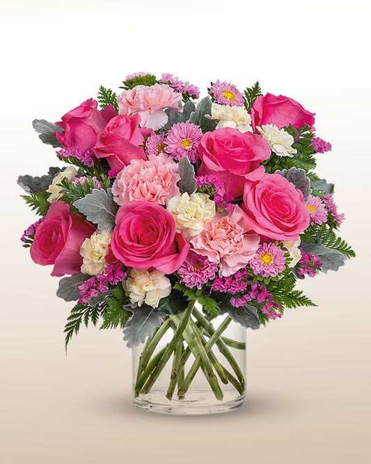 A striking bouquet of vibrant pink roses. Confident, modern, and handcrafted.