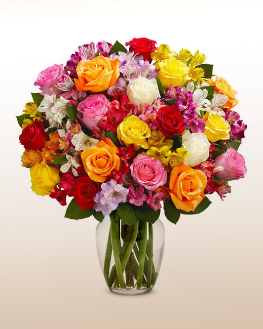 Colorful roses and alstroemerias in vase
