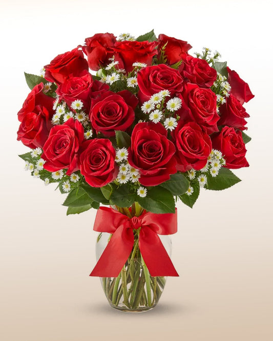 A refined arrangement of 18 premium red roses, delivered worldwide by trusted local florists.