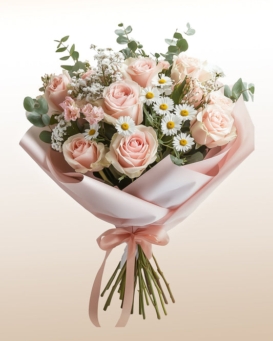 A serene arrangement of blush roses and daisies designed in a refined, modern style. Delivered worldwide with care.