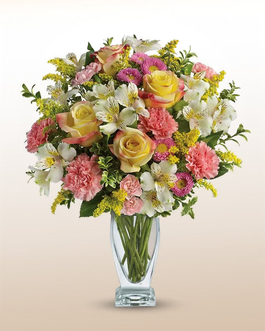 Roses, carnations and alstroemerias in vase