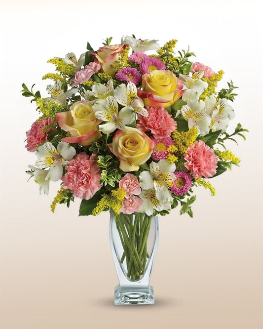 Roses, carnations and alstroemerias in vase