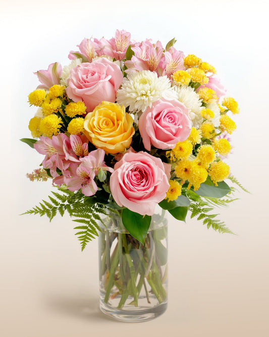 A radiant spring bouquet arranged in a glass vase. Fresh, uplifting, and perfect for heartfelt moments.