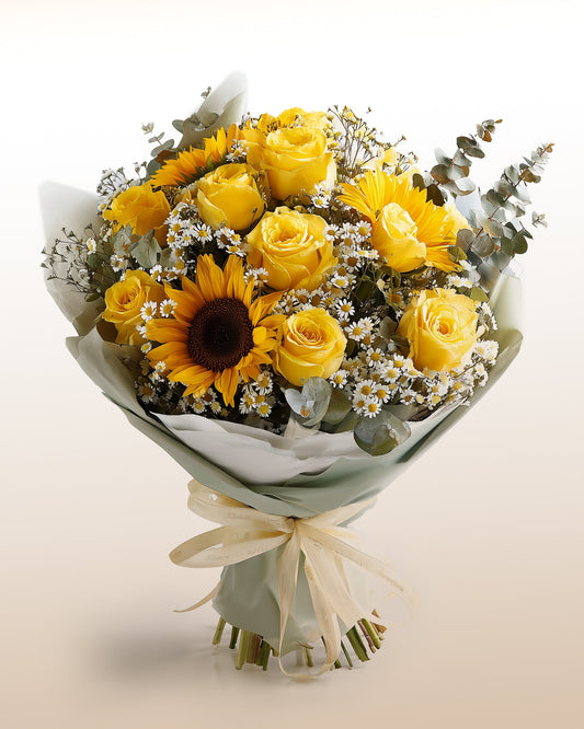 Sunflowers, roses and chamomile mixed bouquet